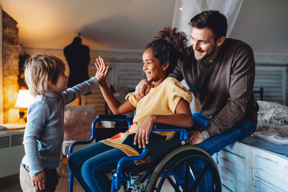 North Wright body image Girl in wheel chair with family